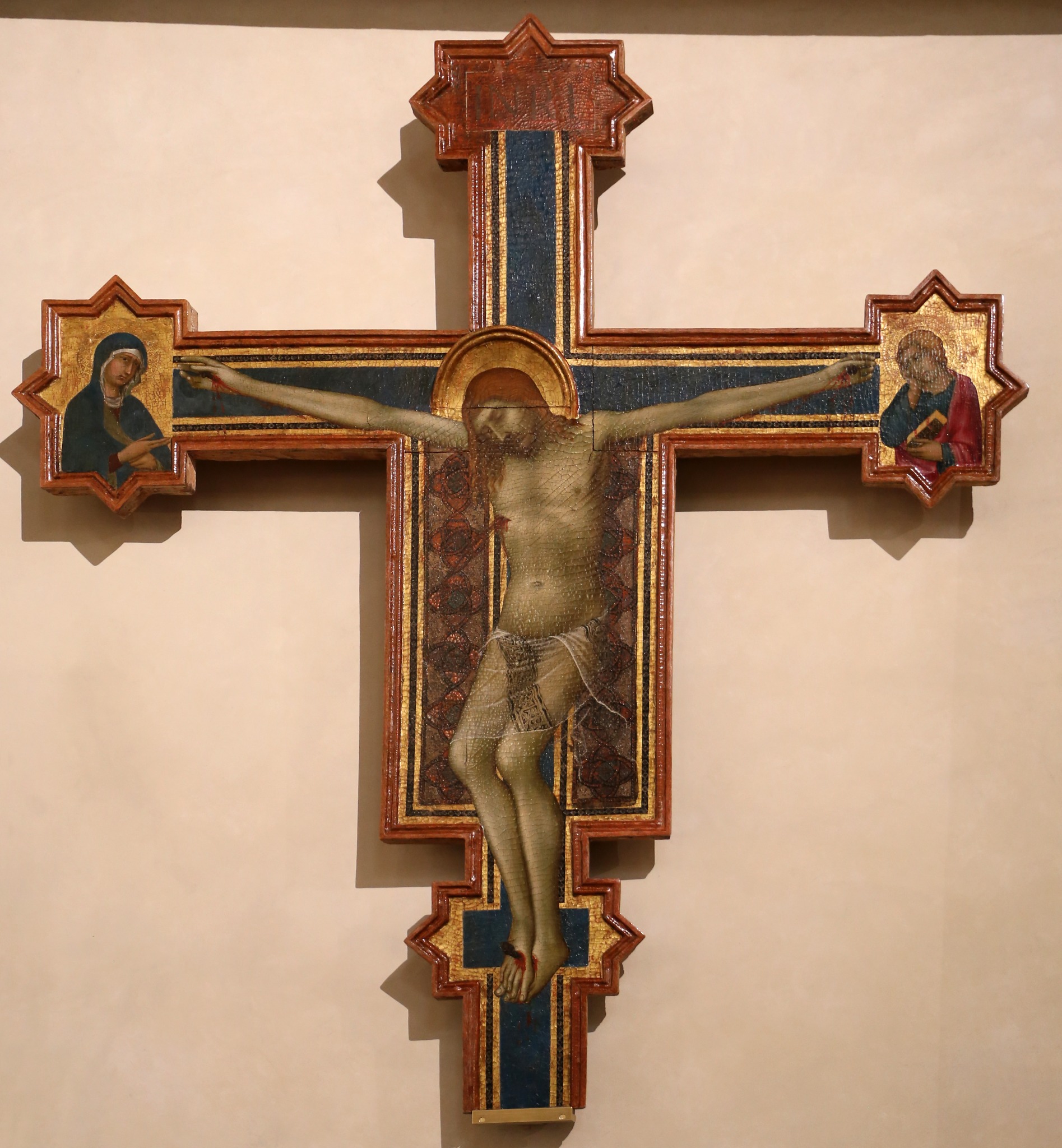 A rescued crucifix and a disputed historical identification