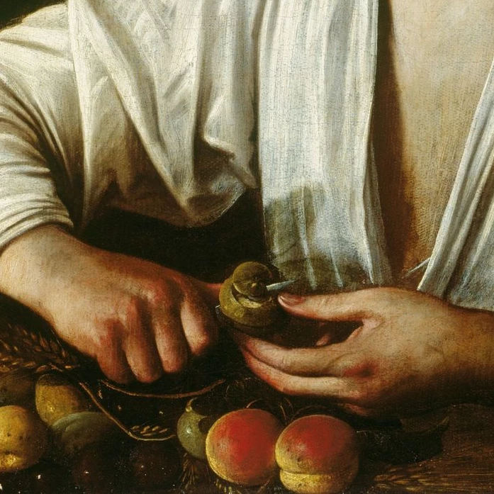 Muchacho pelando fruta