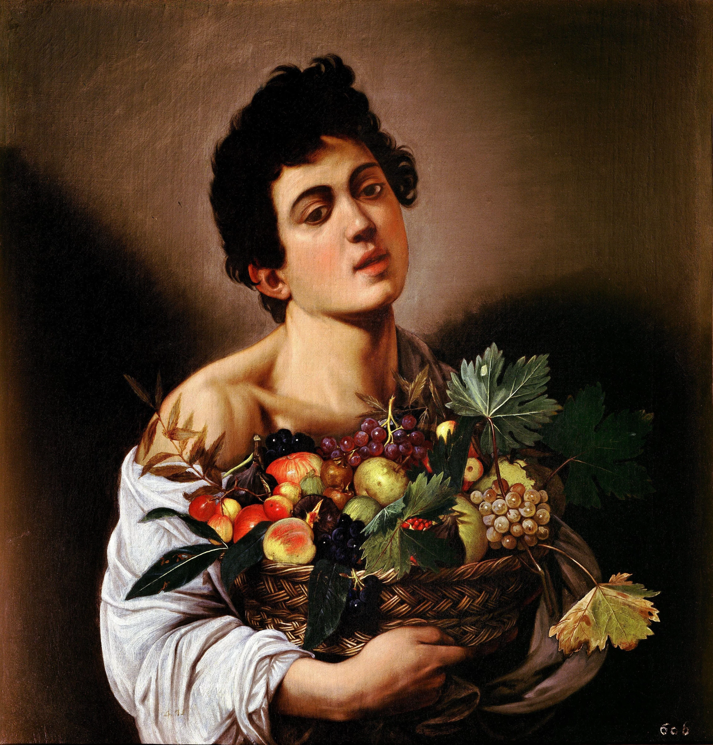 Muchacho con un cesto de frutas